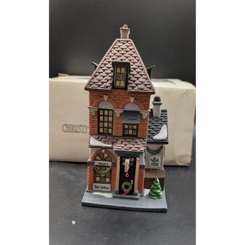 Dept 56 Christmas In The City Potter's Tea Seller 5880-7 Porcelain Village